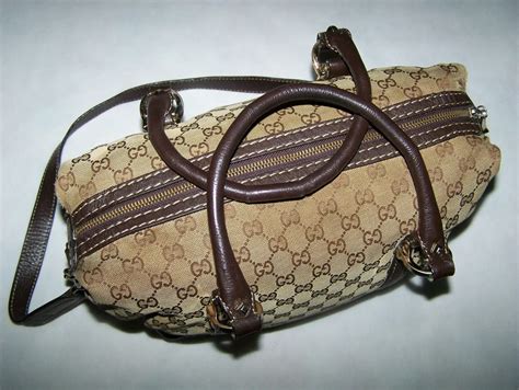 come riconoscere una gucci originale|gucci handbags logo.